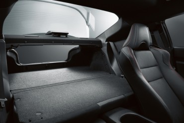 Folding rear seats and a trunk portal provide decent cargo carrying space.
