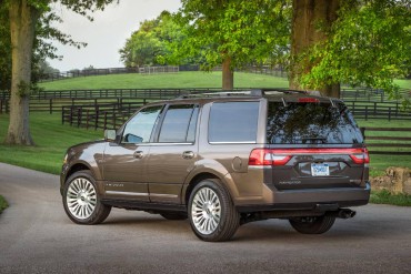 A power lift gate clears tall adults. Styling is conservative and timeless. 