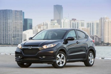 The 2016 Honda HR-V is a compact crossover SUV that resembles the larger Honda CR-V.