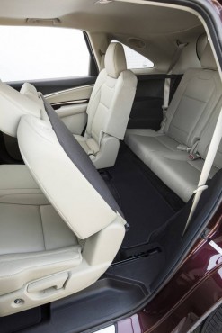 Third row access is enhanced by sliding second row seats and an oversized rear door.
