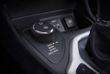 A large console mounted dial controls the many driving mode choices.